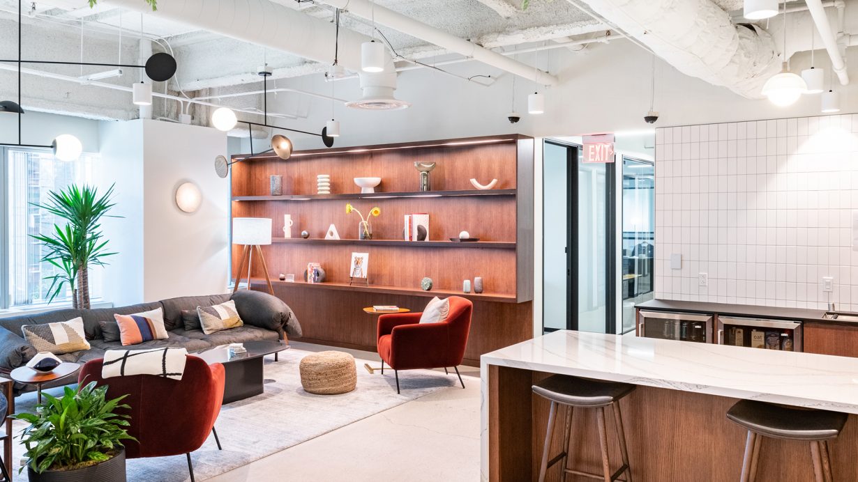 Common spaces are warm, inviting, and filled with greenery.