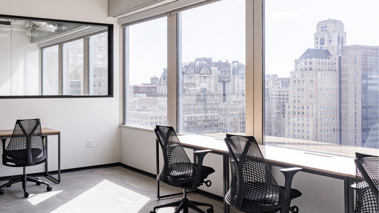 Private offices overlook Philadelphia’s skyscrapers and historic landmarks.