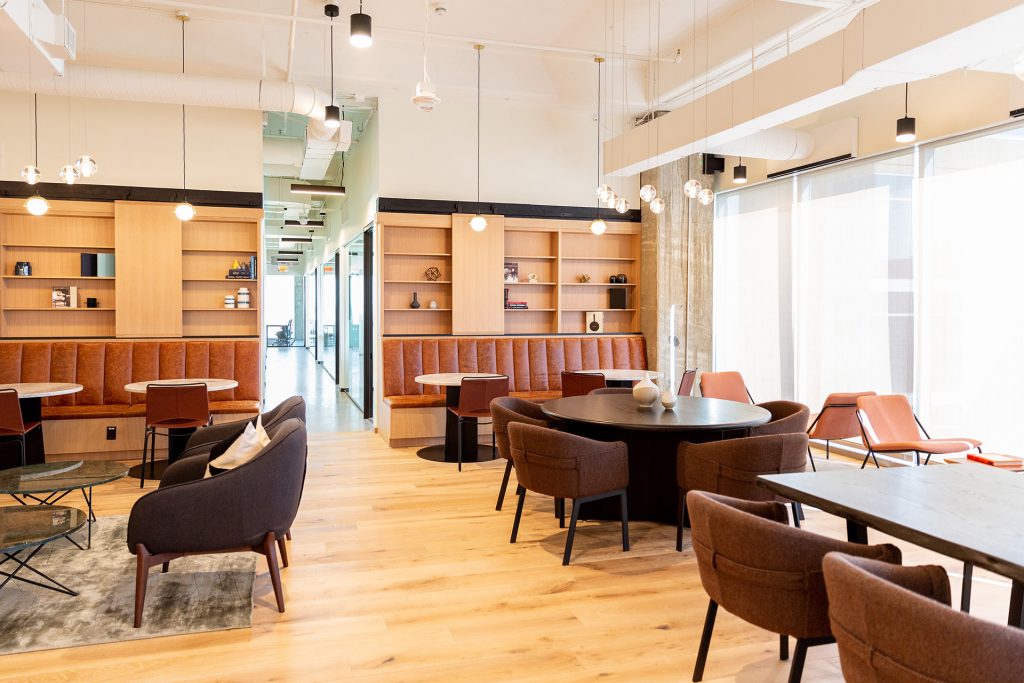 Natural light and chic, contemporary furnishings fill Industrious Plano.