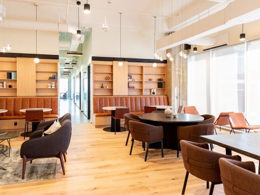 Natural light and chic, contemporary furnishings fill Industrious Plano.