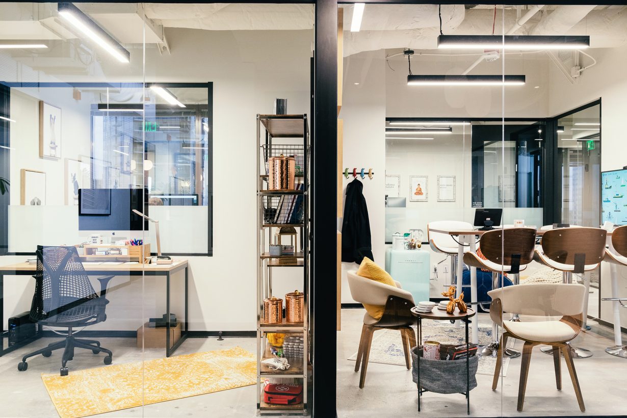 The offices at Industrious Bellevue come fully-furnished with oak desks and Herman Miller chairs.