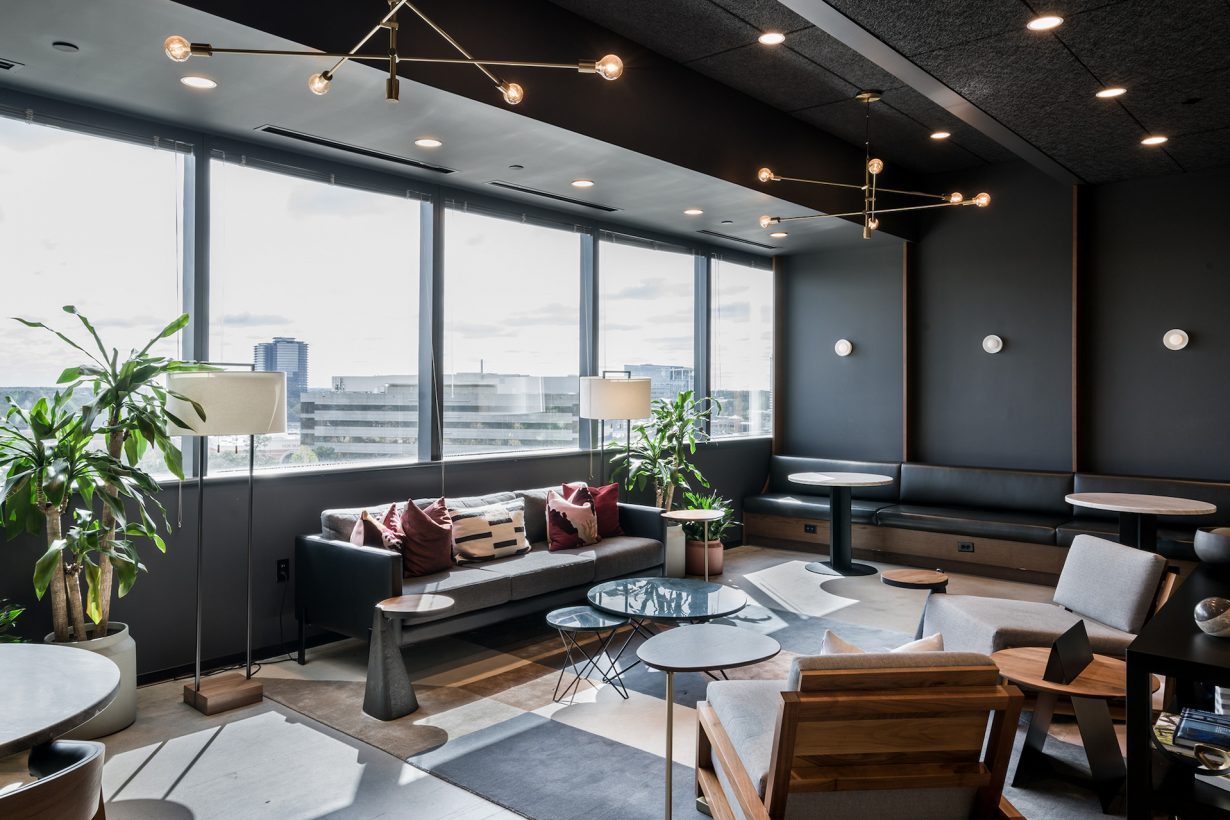 Members can gather in common areas with ample greenery and views of the city.