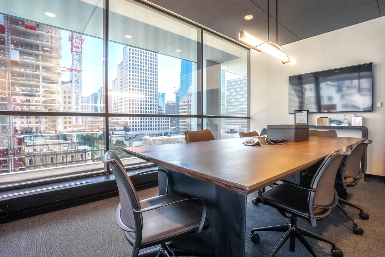 A conference room equipped with A/V for presentations and mixed-presence meetings.