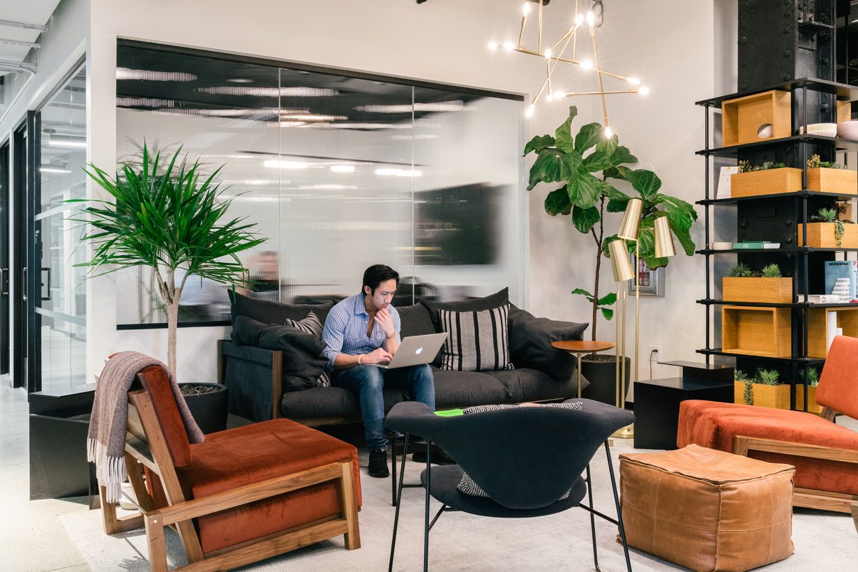 Members work in the lounge at Industrious Union Square.
