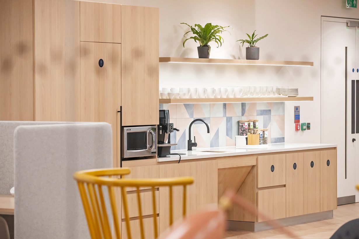 The cafe, where members can enjoy coffee, tea, and an assortment of snacks throughout the day.