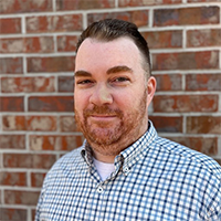 Picture shows Justin Clark - Member Experience Manager